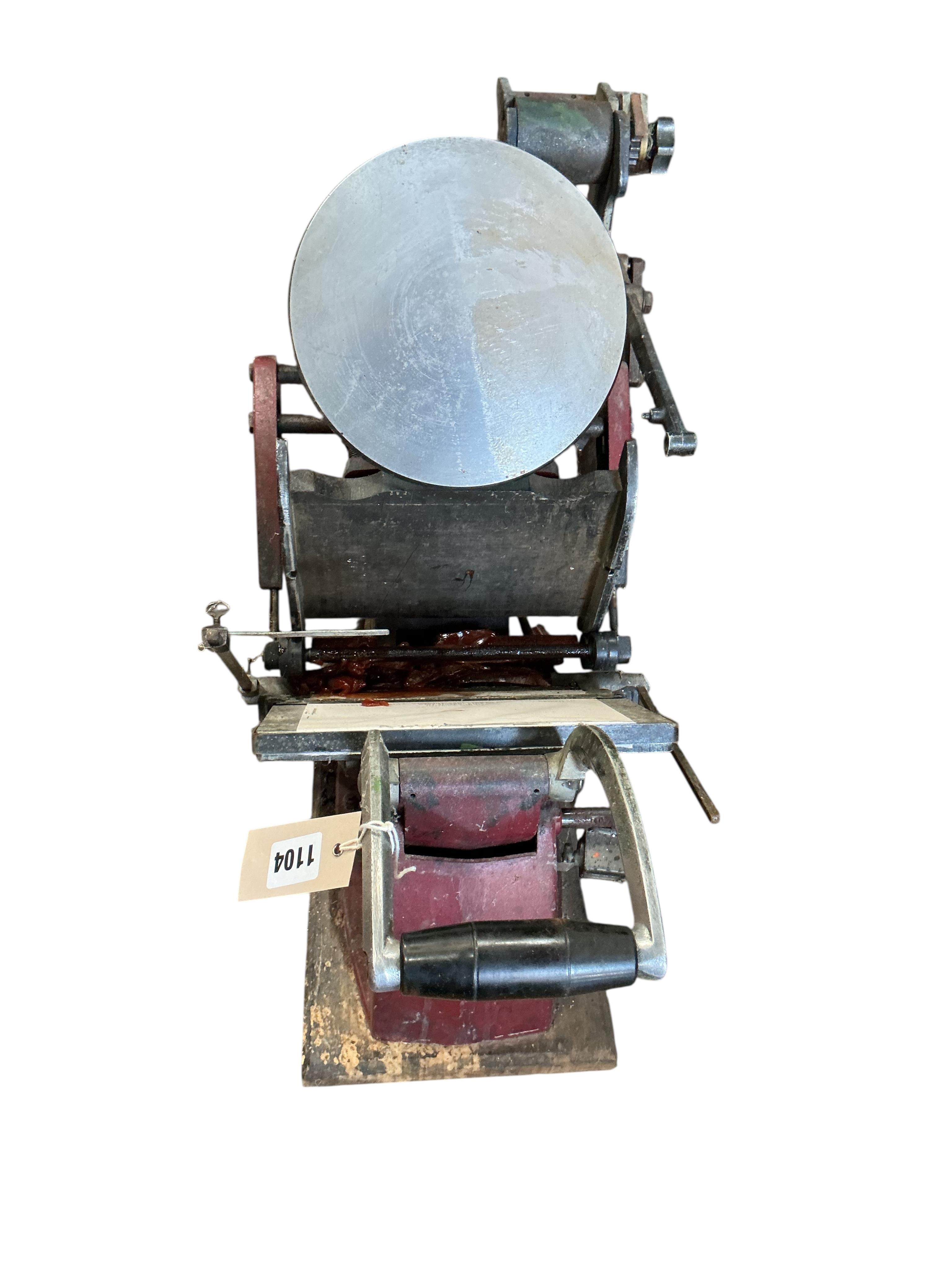 An Adana eight-five printing press with a large quantity of assorted type face, trays, accessories etc.